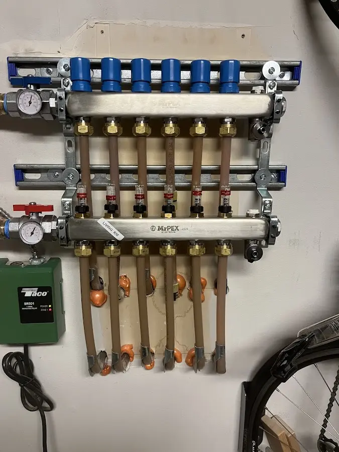 Plumber performing Gas Line Installation at a residential property in Bloomfield